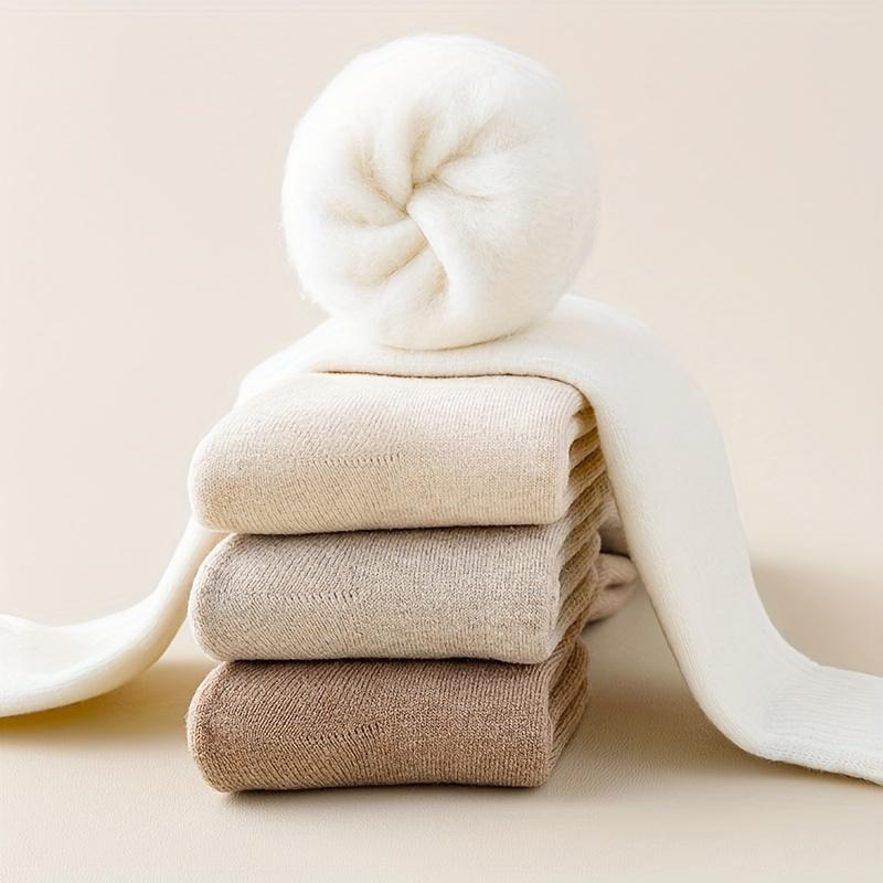 Plain colored knee-high socks with solid fleece lining